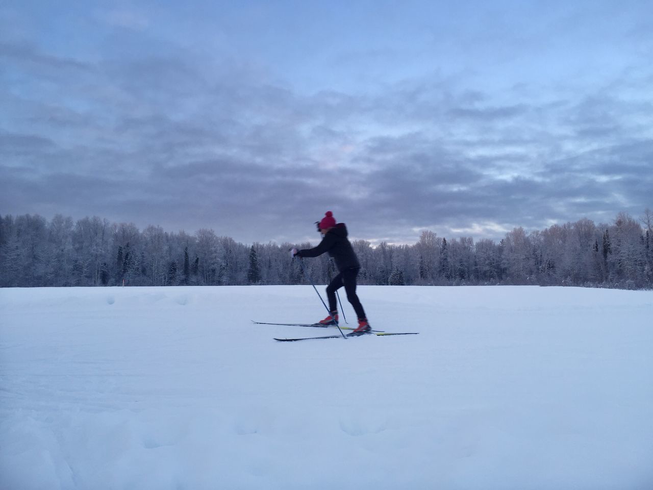 snow, winter, cold temperature, season, full length, weather, lifestyles, leisure activity, warm clothing, covering, sky, rear view, landscape, tranquil scene, field, tranquility, nature, covered