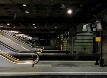 Empty parking lot in illuminated building