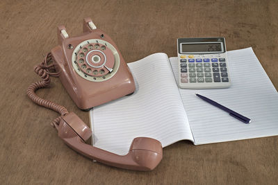 High angle view of mobile phone on table