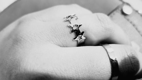 Close-up of insect on hand