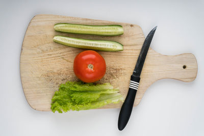 High angle view of vegetables on cutting board