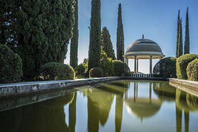 Gazebo in park against sky