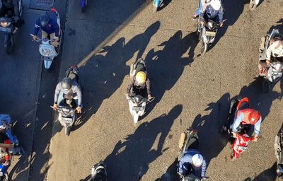 High angle view of people on street in city