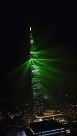 Aerial view of illuminated city at night