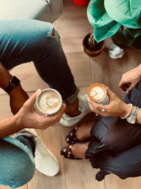 High angle view of people and coffee