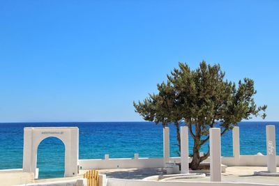 Scenic view of sea against clear blue sky