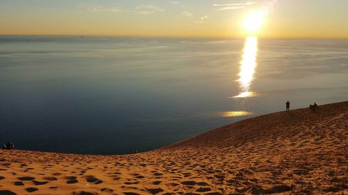 Scenic view of beach during sunset