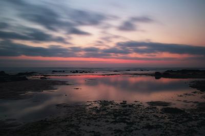 Dramatic sky over sea during sunset