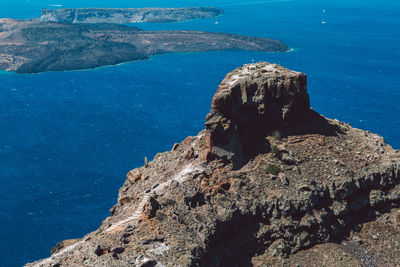 Scenic view of sea against mountain