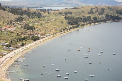 High angle view of city by sea