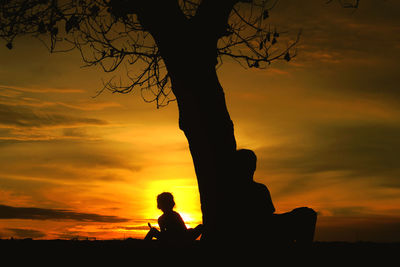 Silhouette of man at sunset