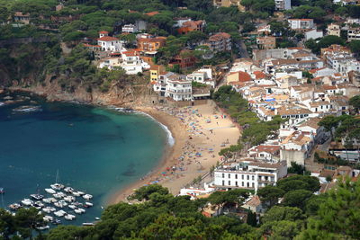 High angle view of town by sea