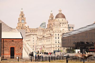 Group of people in front of building