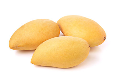 Close-up of oranges against white background