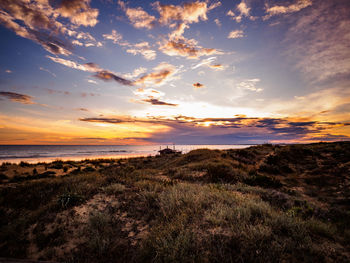 Scenic view of sea against sky during sunset