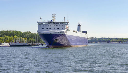 Ship in sea against clear sky