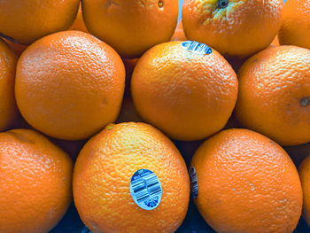 Full frame shot of oranges in market