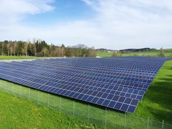 Solar panel on grassy field