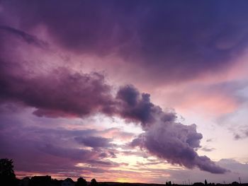 Low angle view of dramatic sky during sunset