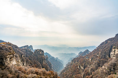 Panoramic view of mountain range against sky