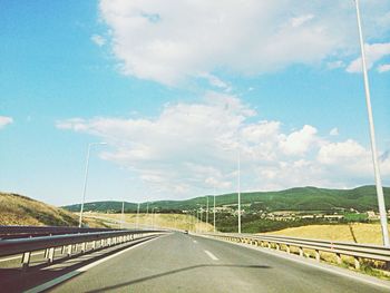 Empty country road along landscape