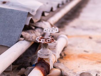 High angle view of rusty pipe