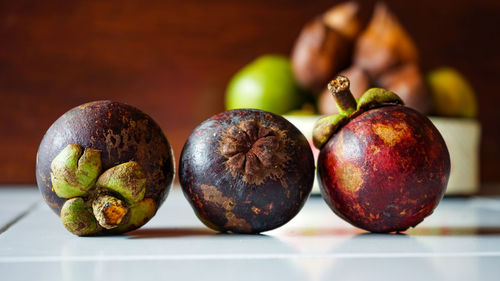 Close-up of apples on table