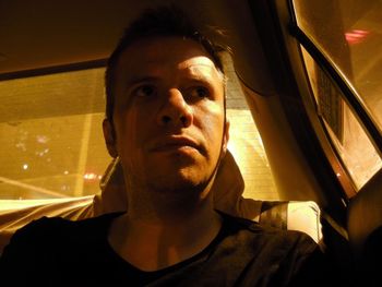 Portrait of man in car