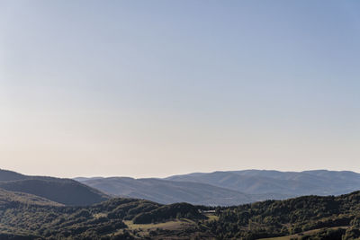 Scenic view of mountains against clear sky