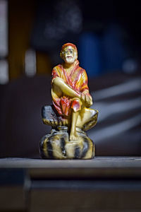 Buddha statue on table