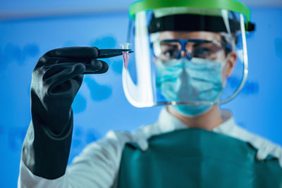 Female scientist experimenting in laboratory