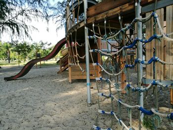 Clothes hanging on bare tree