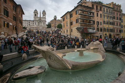 People at town square against sky