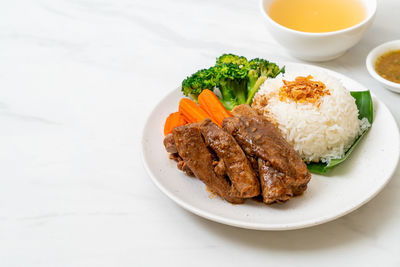 Close-up of food in plate on table