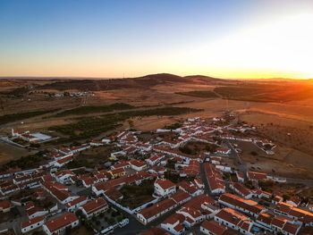 Aerial view of a landscape with village in alentejo at the sunset. portugal. drone photo