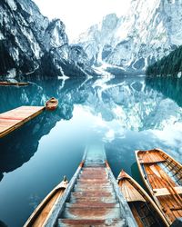 High angle view of lake by snowcapped mountains during winter