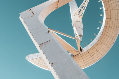 Low angle view of tower against clear blue sky