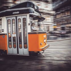 Train on street in city