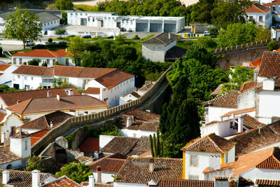 High angle view of houses and buildings in town