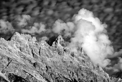 Low angle view of rocks against sky