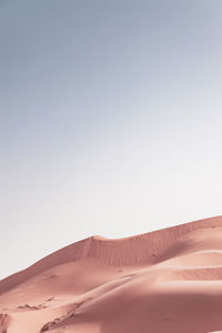 Scenic view of desert against clear sky