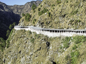 High angle view of dam by river against mountain
