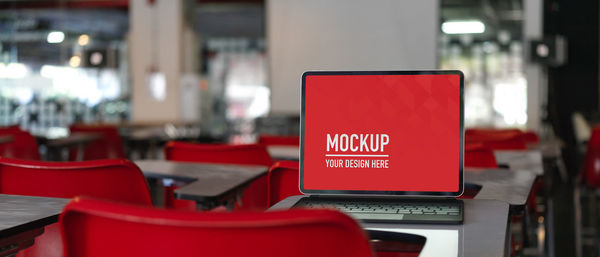 Close-up of stop sign on table