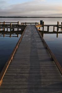 Pier over sea against sky