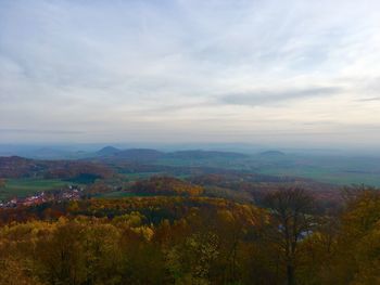 Scenic view of landscape against sky during autumn