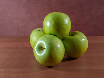 Close-up of apples on table