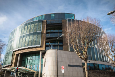 Low angle view of modern building against sky