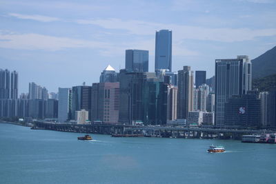 View of city buildings against sky