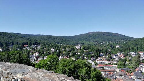 Scenic view of town against clear sky