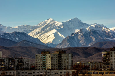 View of city against mountain range